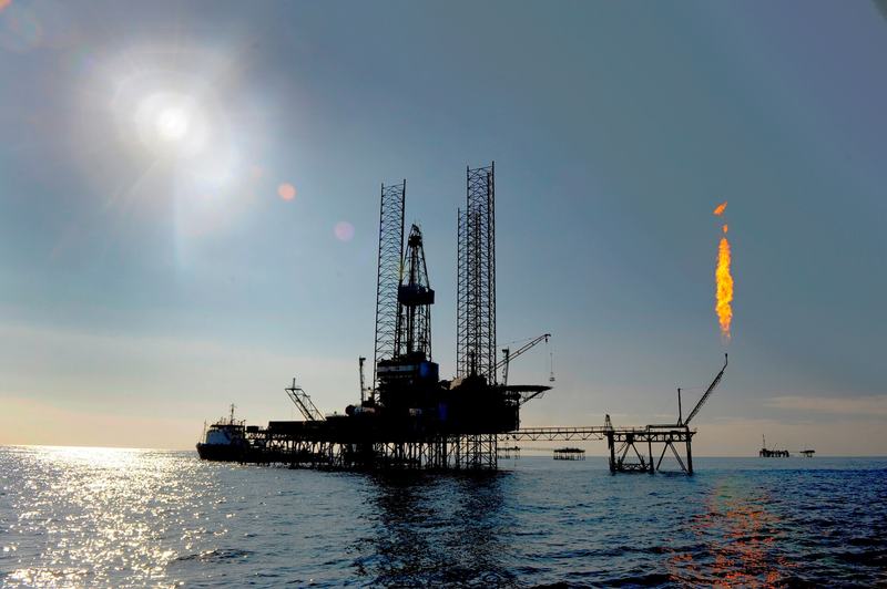 A jack-up drilling rig standing offshore